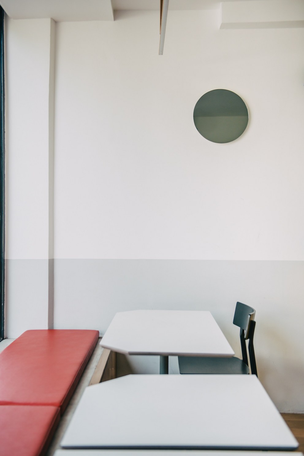 Community Cafe, Stoke Newington | Upholstered seating, bespoke mirrors and half height painted walls | Interior Designers